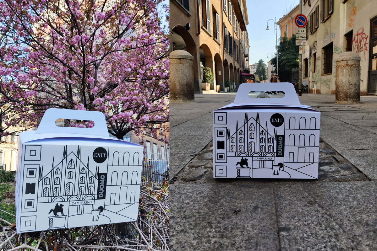ambientazione contesto urbano in strada e con fiori con logo Exit